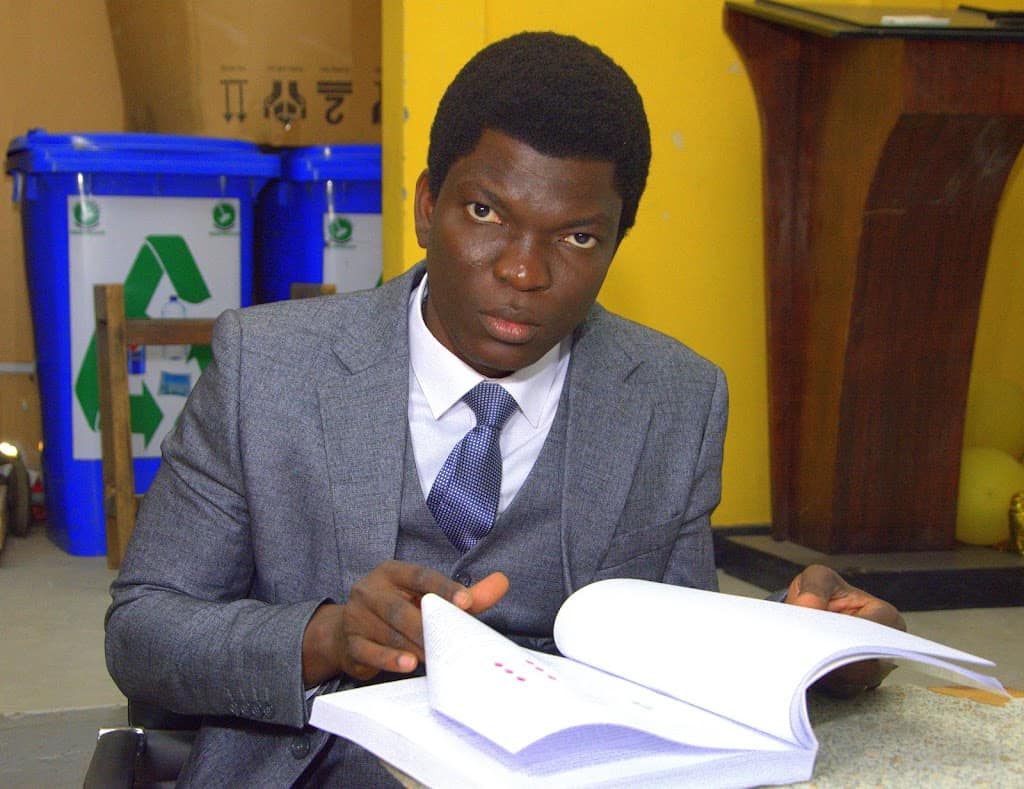 Bessan Melckior Dégboé reading book 1 - Bessan Melckior Dégboé